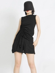 Women's black sleeveless top with side drawstrings and matching shorts fashion set
