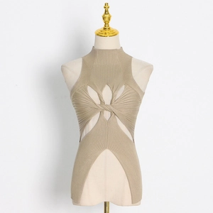 Detailed close-up of khaki knit halter top with hollow-out cutouts and twist design