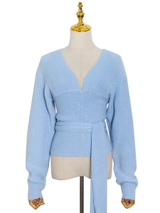 Elegant light blue V-neck knit sweater with long sleeves and adjustable waist tie belt