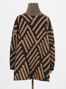 Black and brown striped mink fur sweater featuring high neck design and loose knit fit