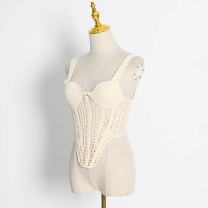 Sleek cream crochet corset top with sheer hollow knit and V-shaped hemline