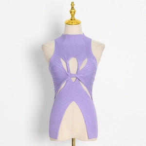 Detail of purple ribbed knit top with a high neckline and chic twist-knot cutout design