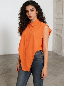 Chic orange sleeveless shirt with asymmetric V-cut hem and tailored lapel collar