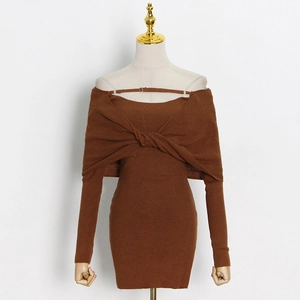 Detail of dark brown ribbed knit mini dress with off-shoulder twist design and neck strap