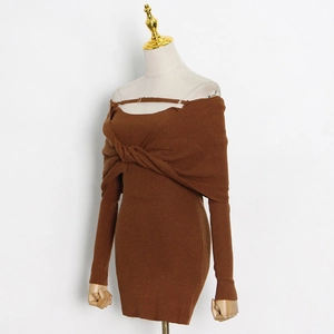 Close-up of brown ribbed knit dress with off-shoulder knot detail and thin strap