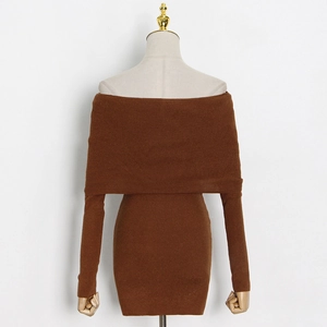 Detailed view of the fine ribbed knit texture and knot design on the brown mini dress