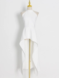 Detailed view of white halter neck hi-lo dress on mannequin with irregular hemline