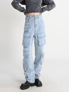 High-waisted light blue cargo wide leg jeans with utility pockets and a chain belt