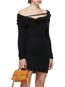 Off-shoulder black knit bodycon dress with long sleeves and elegant metal strap details