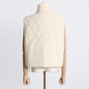 Back view of cream high collar quilted puff vest featuring diamond stitch details