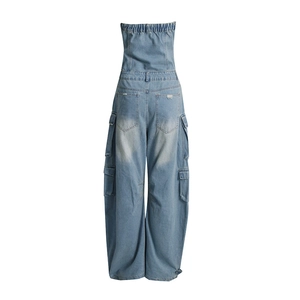 Back view of light blue denim strapless jumpsuit showing cargo pockets and waist detail