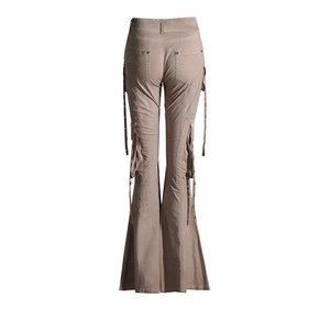 Detail view of khaki flare cargo pants featuring back pockets and hanging strap accents