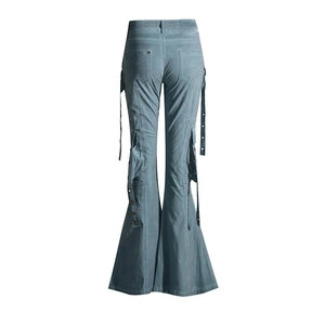 Detail view of high-waist flare cargo pants with side pockets and decorative long ribbons