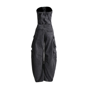 Back view of a strapless black denim jumpsuit with cargo pockets and elastic back