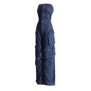 Close-up of strapless denim jumpsuit featuring multi-pocket cargo design and washed finish