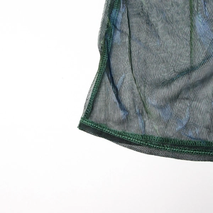 Detail of iridescent mesh fabric with high-waist A-line skirt stitching and lockstitch edge