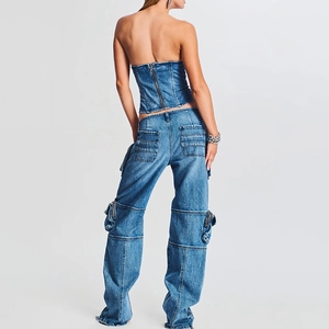 Rear view of high-waist cargo jeans and zip-up denim tube top set in washed blue color