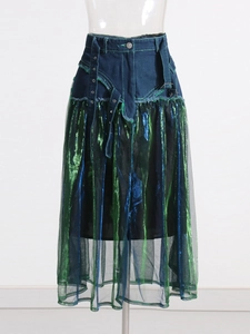 High-waist A-line denim skirt with shimmering turquoise mesh patchwork and belt detail