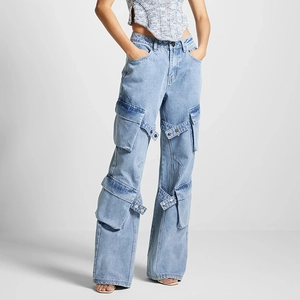 Detailed view of light blue cargo jeans with utility pockets and strap decorations