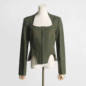 Detail of army green corset top with square neckline and asymmetric hemline