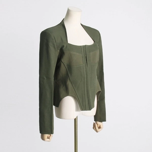 Detail of army green corset blazer showing structured waist seams and square neckline