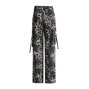 Detail view of leopard print cargo pants showing large utility side pockets and straps