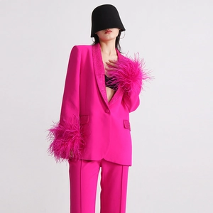 Hot pink blazer detail featuring rhinestone collar and ostrich feather cuffs trim