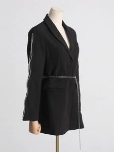 Elegant black blazer dress with rhinestone sleeves and slim metallic chain belt