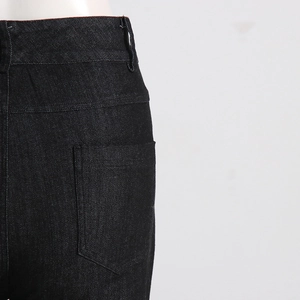 Detailed back view of high waist jeans showing stitching on rear pocket and denim texture