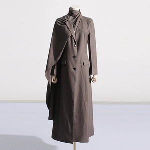 Detail of a brown long blazer coat with a unique integrated scarf collar design