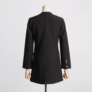Back view of tailored black blazer with sleeve button detail and center vent on mannequin