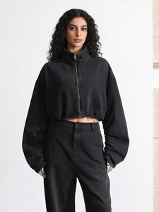 Short black utility denim jacket for women with high neck and drawstring hem detail