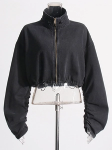 Short black stand-collar utility denim jacket with drawstring hem and pleated sleeves