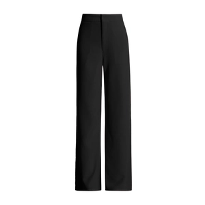 Detail view of high-waist straight-leg suit trousers with smooth fabric and clean stitching