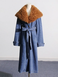 Blue denim trench coat featuring a detachable brown faux fur collar and waist belt