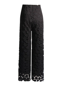 High-waist wide-leg trousers in black featuring hollow geometric honeycomb textures