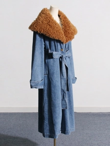 Long denim trench coat with detachable brown faux fur collar and belted waist for women