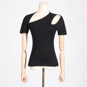Detailed view of the hollow geometric cutout design on a black asymmetric shoulder top