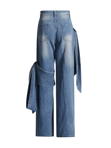 Jean large taille haute bleu délavé pour femme avec nœud décoratif latéral