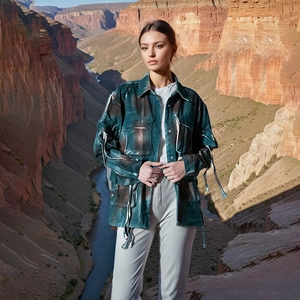 Outdoor shot of vintage utility jacket with oversized pockets and camouflage dye