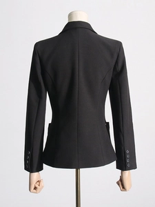 Slim fit black women's blazer featuring a tailored back seam and four-button cuffs