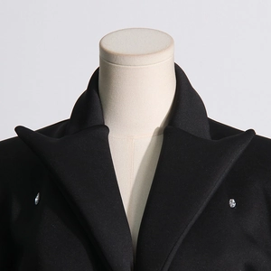 Detail of V-neck collar with rhinestones on a black short blazer dress for women