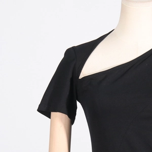 Detail of black one-shoulder top with unique hollow-out neckline and knit texture