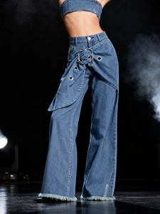 High-waist wide-leg jeans with buckle waist detail and frayed hems on black background
