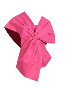 Elegant rose red asymmetric top with oversized decorative bow and satin finish texture