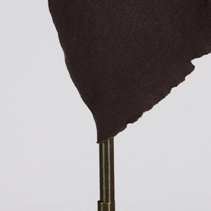 Macro view of dark brown rib-knit fabric texture with exquisite wavy edge details
