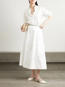 Elegant white A-line skirt with 3D floral applique and matching long sleeve shirt
