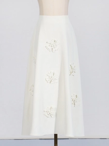 Elegant white A-line maxi skirt with 3D floral appliques and high waist design