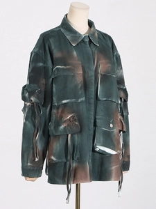 Women's utility denim jacket with camouflage tie-dye, large pockets and drawstring details