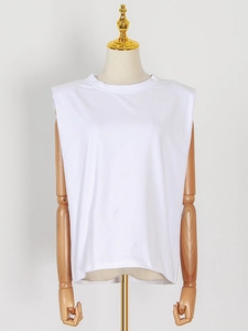 Minimalist white sleeveless T-shirt for women featuring padded shoulders and round neck design